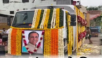 રાજકોટમાં ફુલો વરસાવીને લોકોએ સ્વ  વિજય રૂપાણીને અંતિમ વિદાય આપી